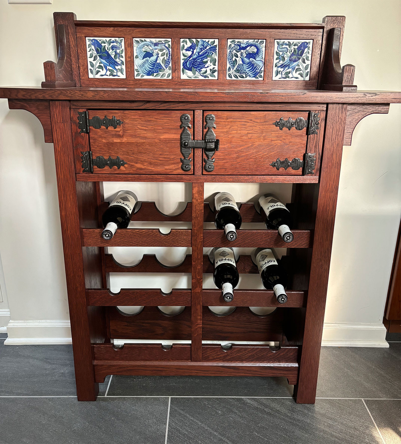Custom winerack with De Morgan Tiles